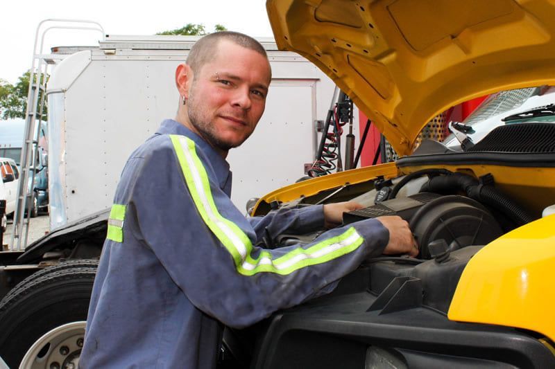 Nick’s Towing diesel mechanic in Wallington NJ performing engine diagnostics and fleet maintenance.