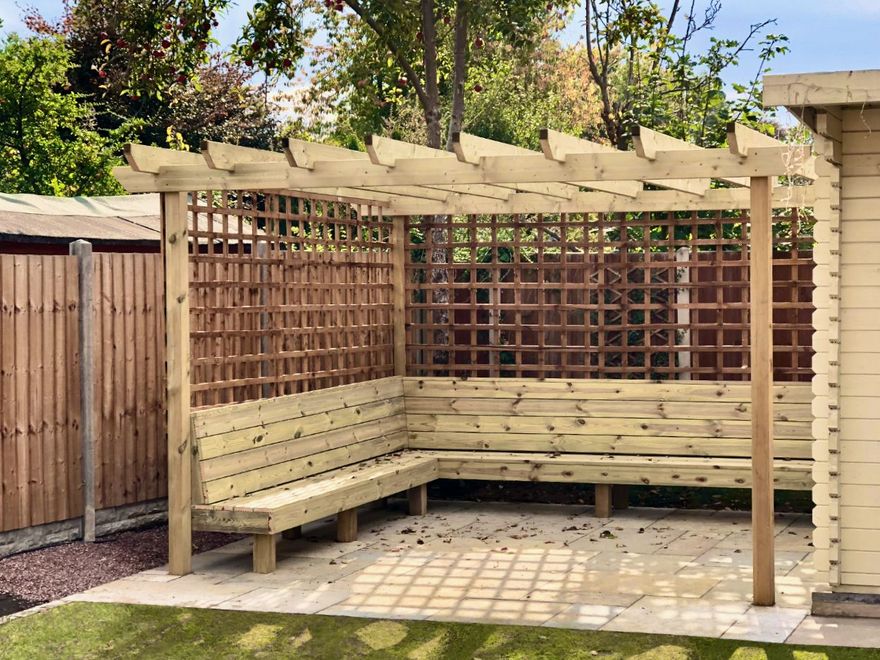 Conroy Landscapes, Large Softwood Pergola Seating Area With Integrated Benching and Trellis