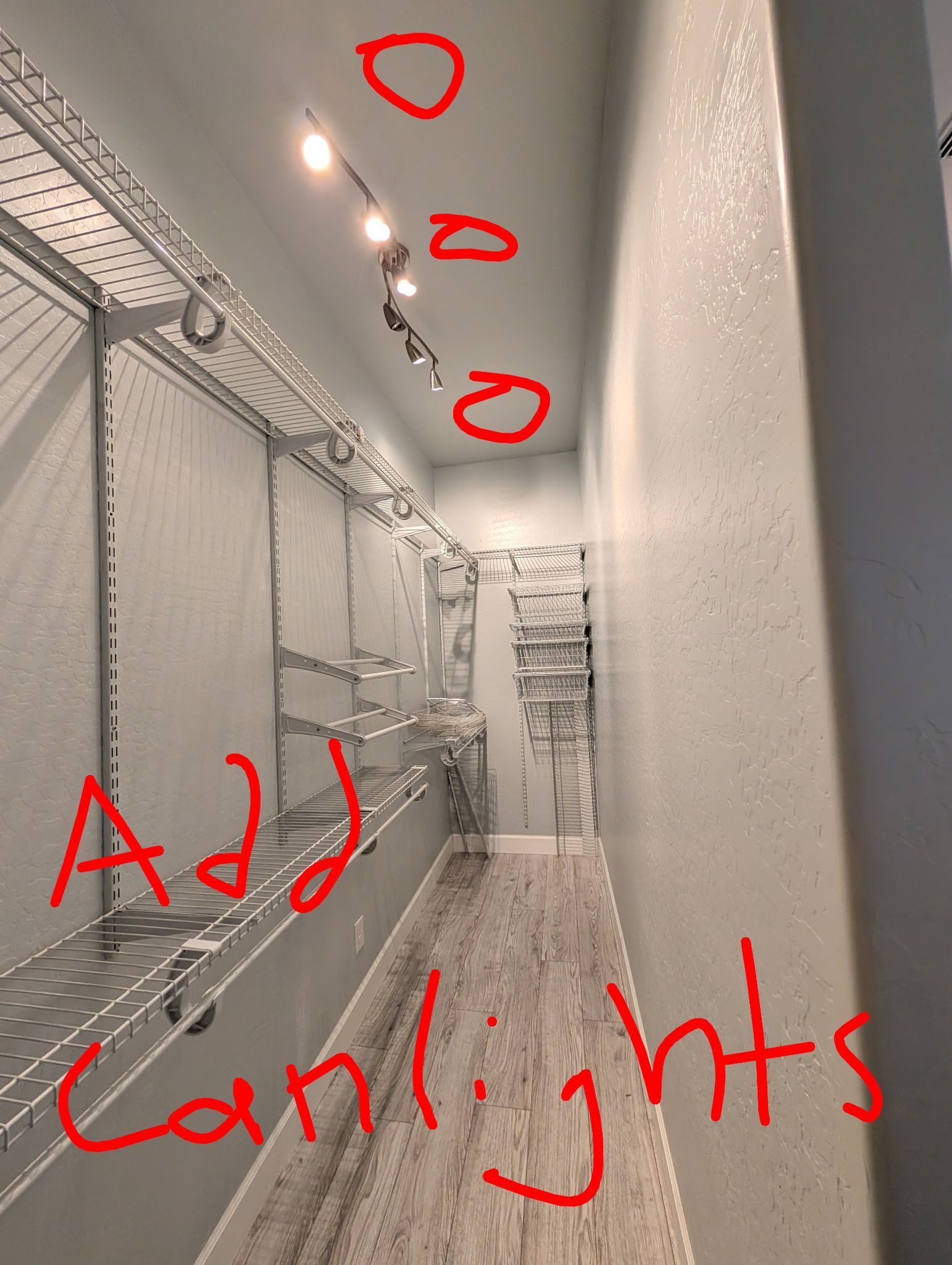 Narrow closet with wire shelving and overhead track lighting; text indicates adding can lights.