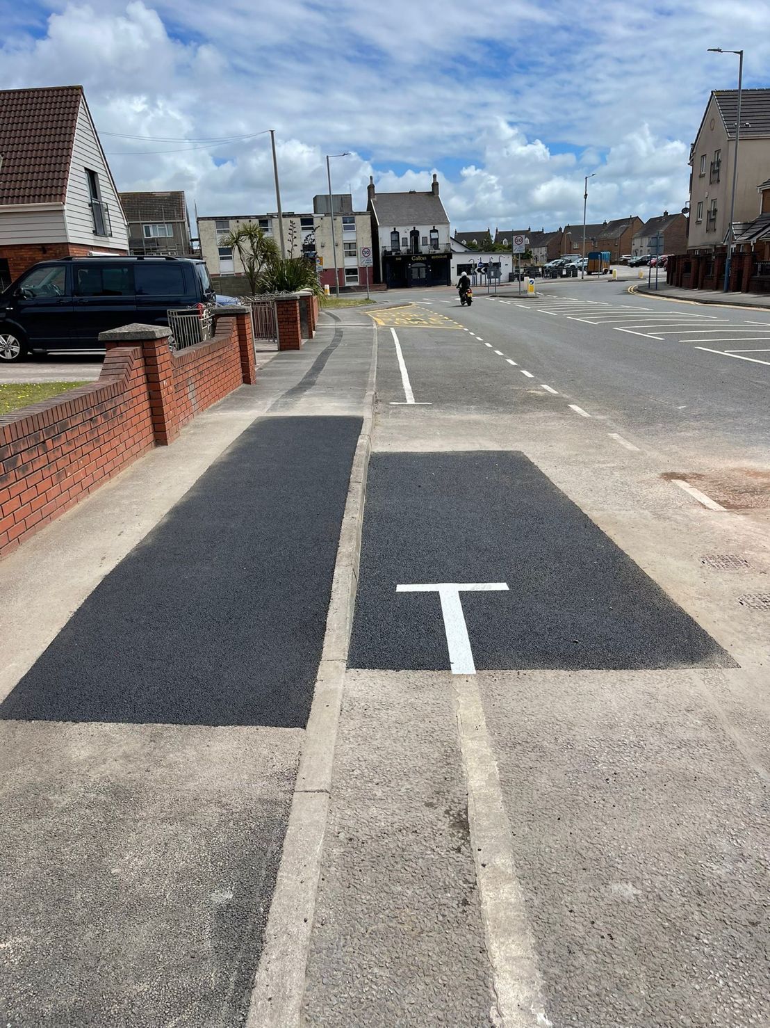 DP Cable Jointing | A white t is painted on the side of a road