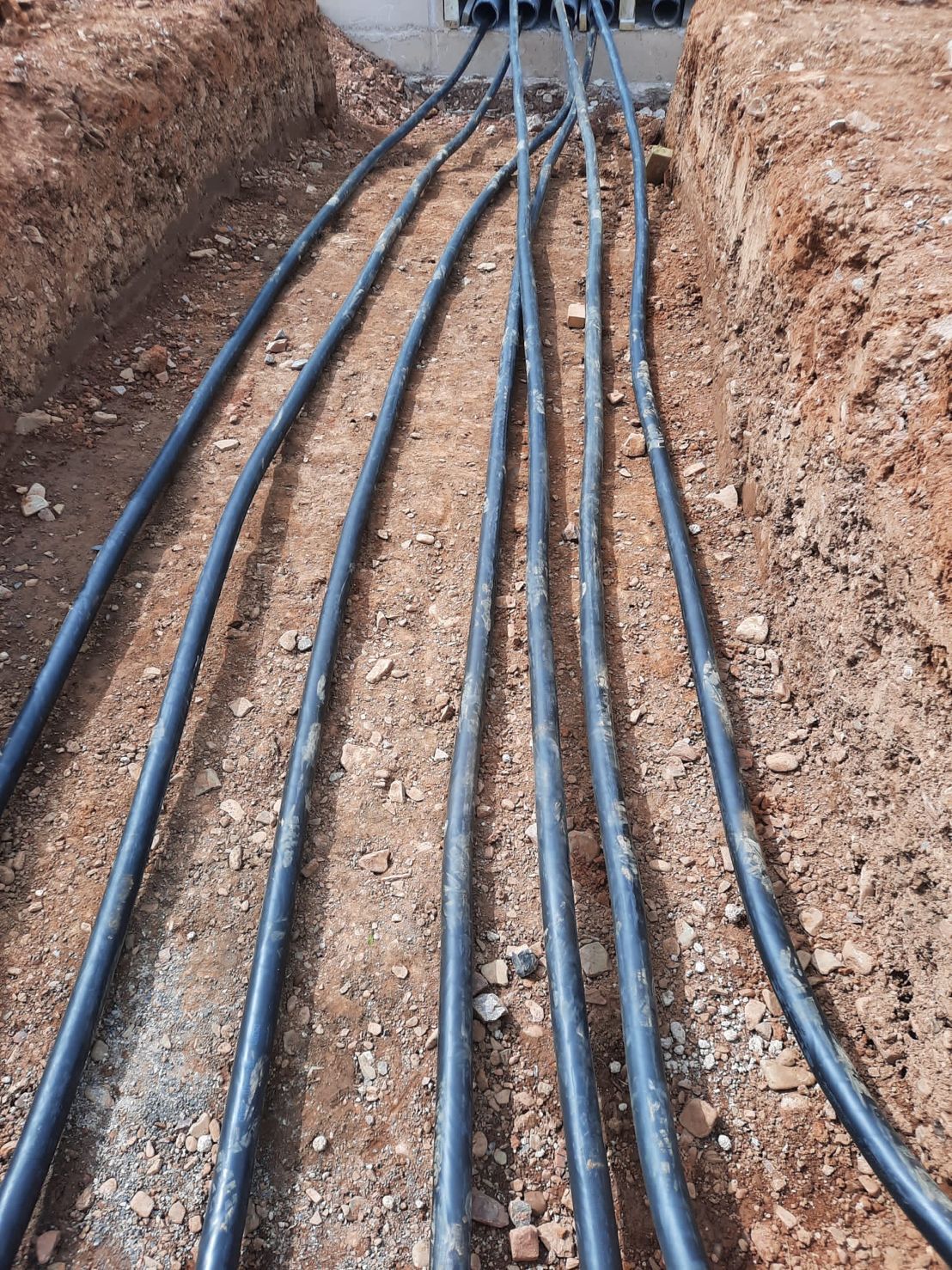 DP Cable Jointing | A bunch of electrical wires are laying in the dirt