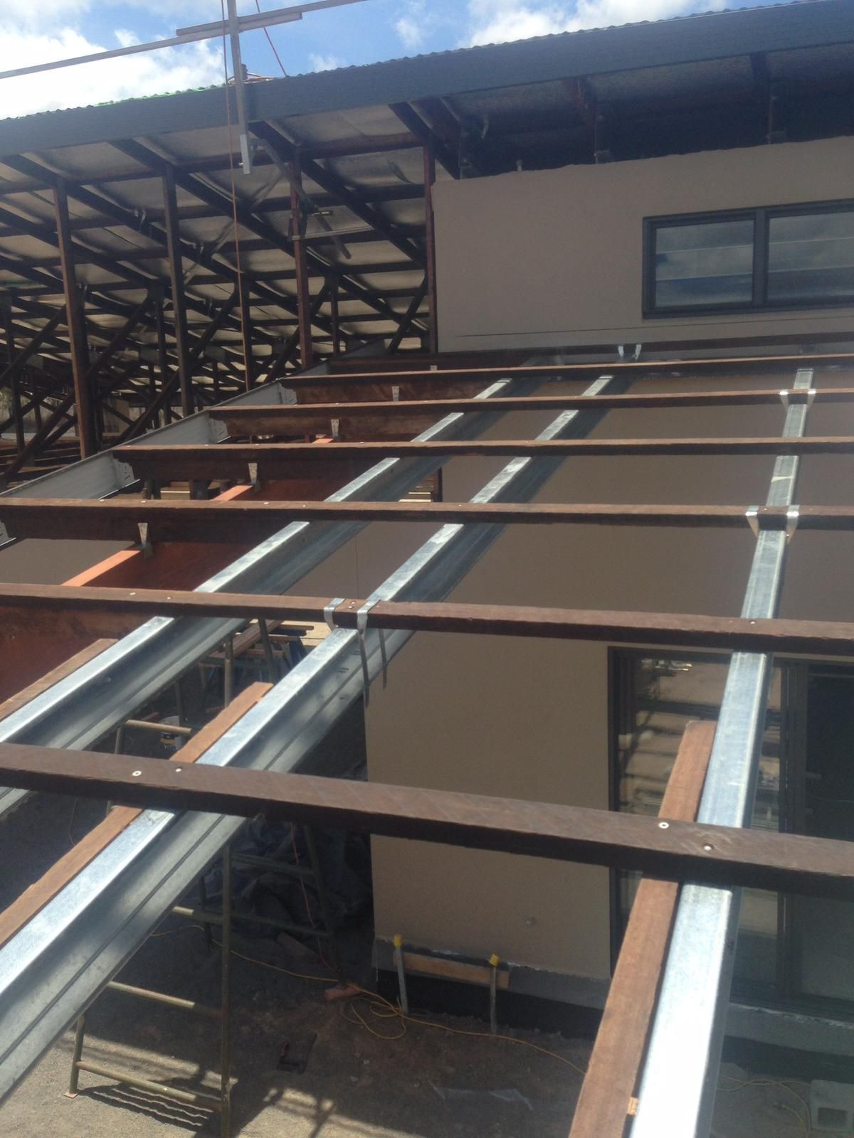 Exposed Roof Beams, Metal Supports, and Building Exterior — Ericson Constructions in Mareeba, QLD