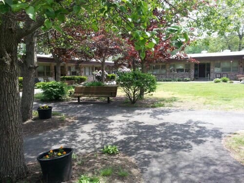 Bench in garden - Housing in Rockland, MA