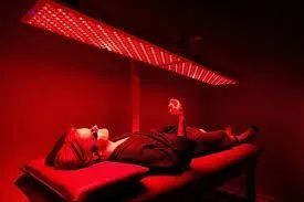 Person getting red light therapy treatment