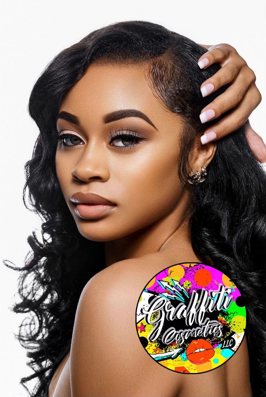 A woman with long blonde hair is wearing a black leather top.