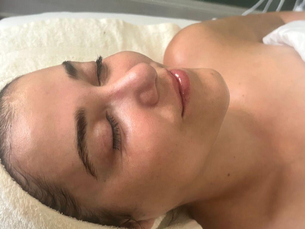 A woman is getting a deep pore cleasing facial treatment at Spa La La Tampa..