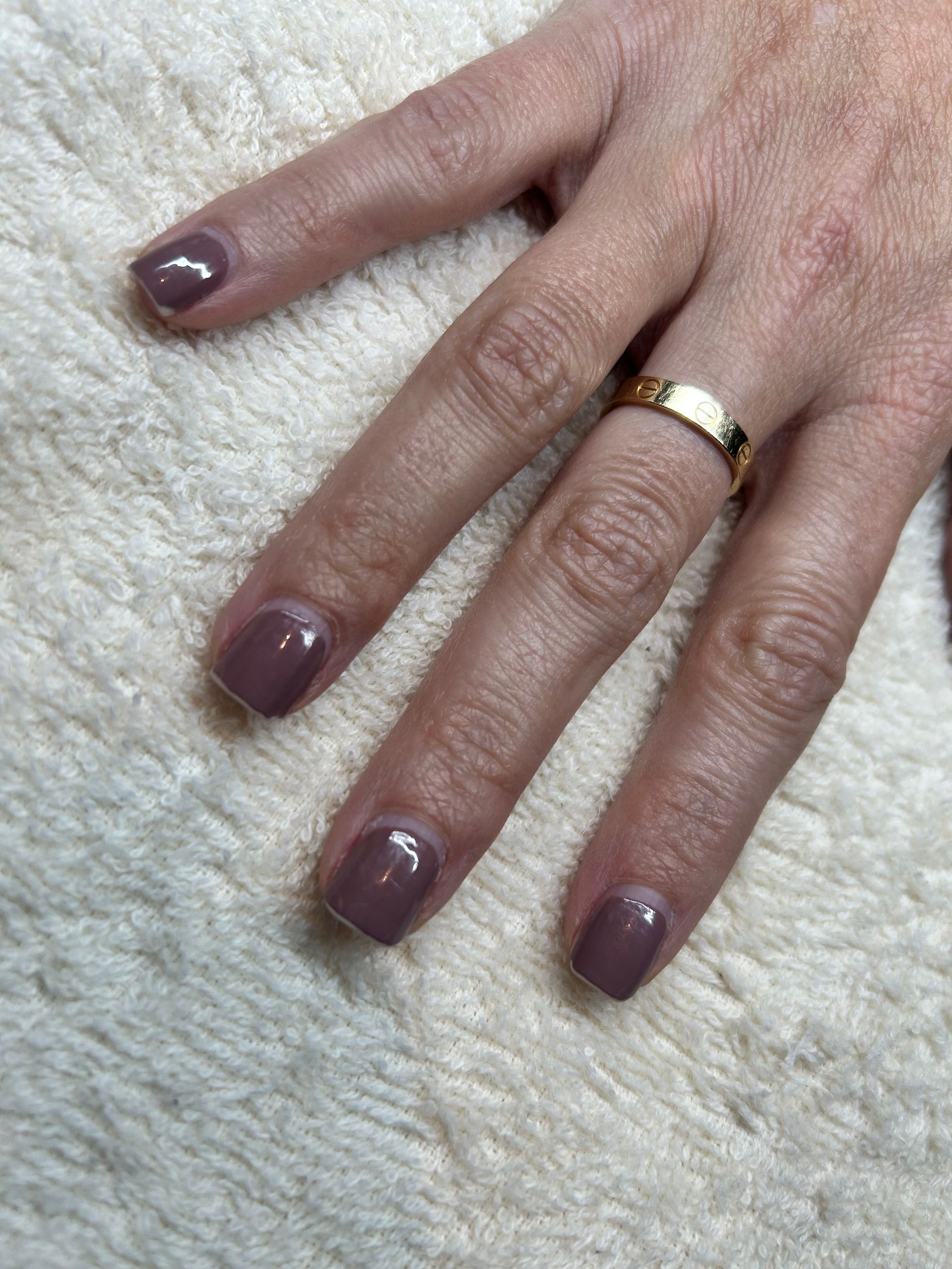 closeup of Taupe painted nails before Dazzle dry Spa manicure