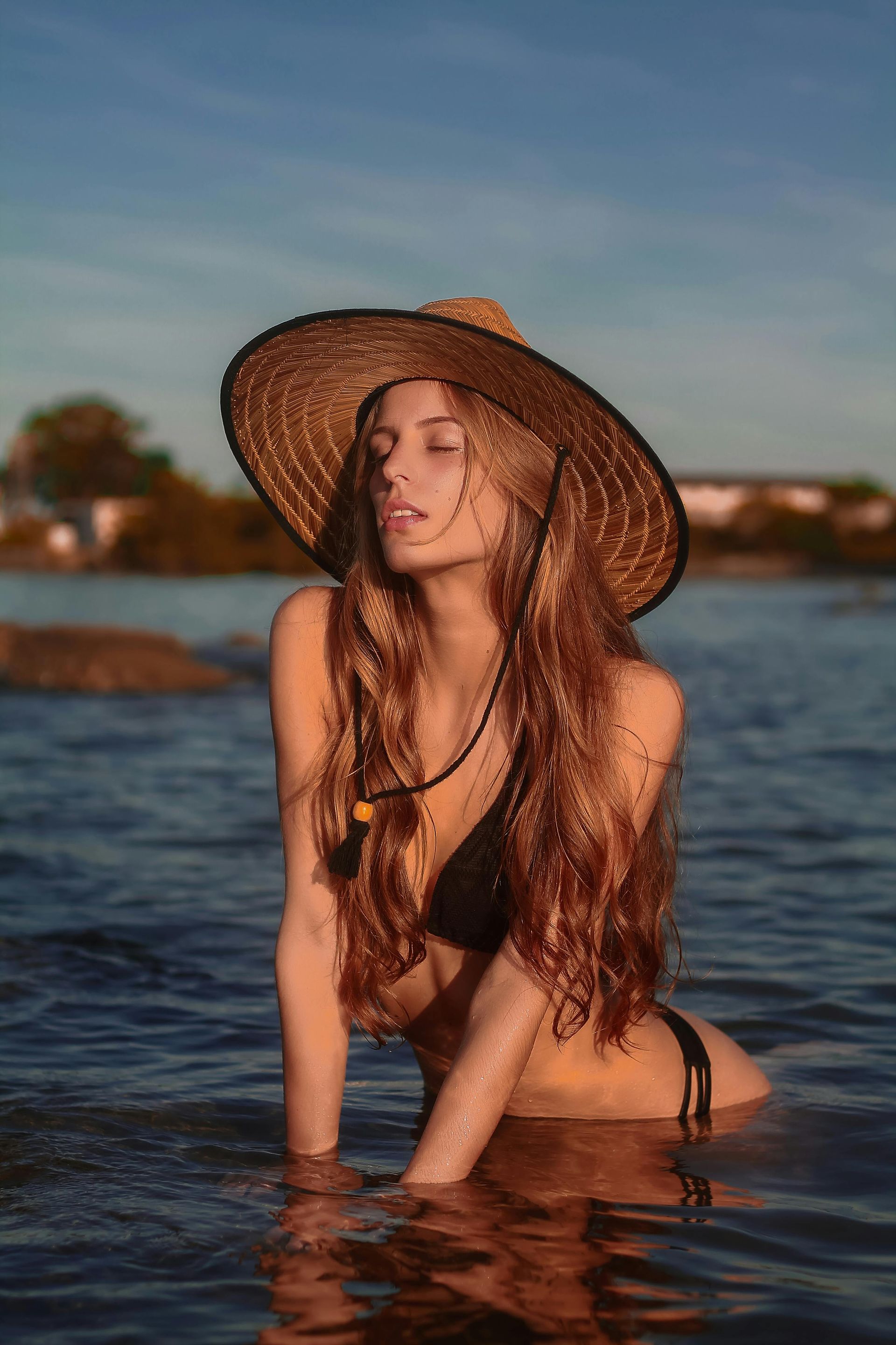Woman in a blissful state with glowing skin and eyes closed after receiving an anti-facial at Spa La La Tampa.