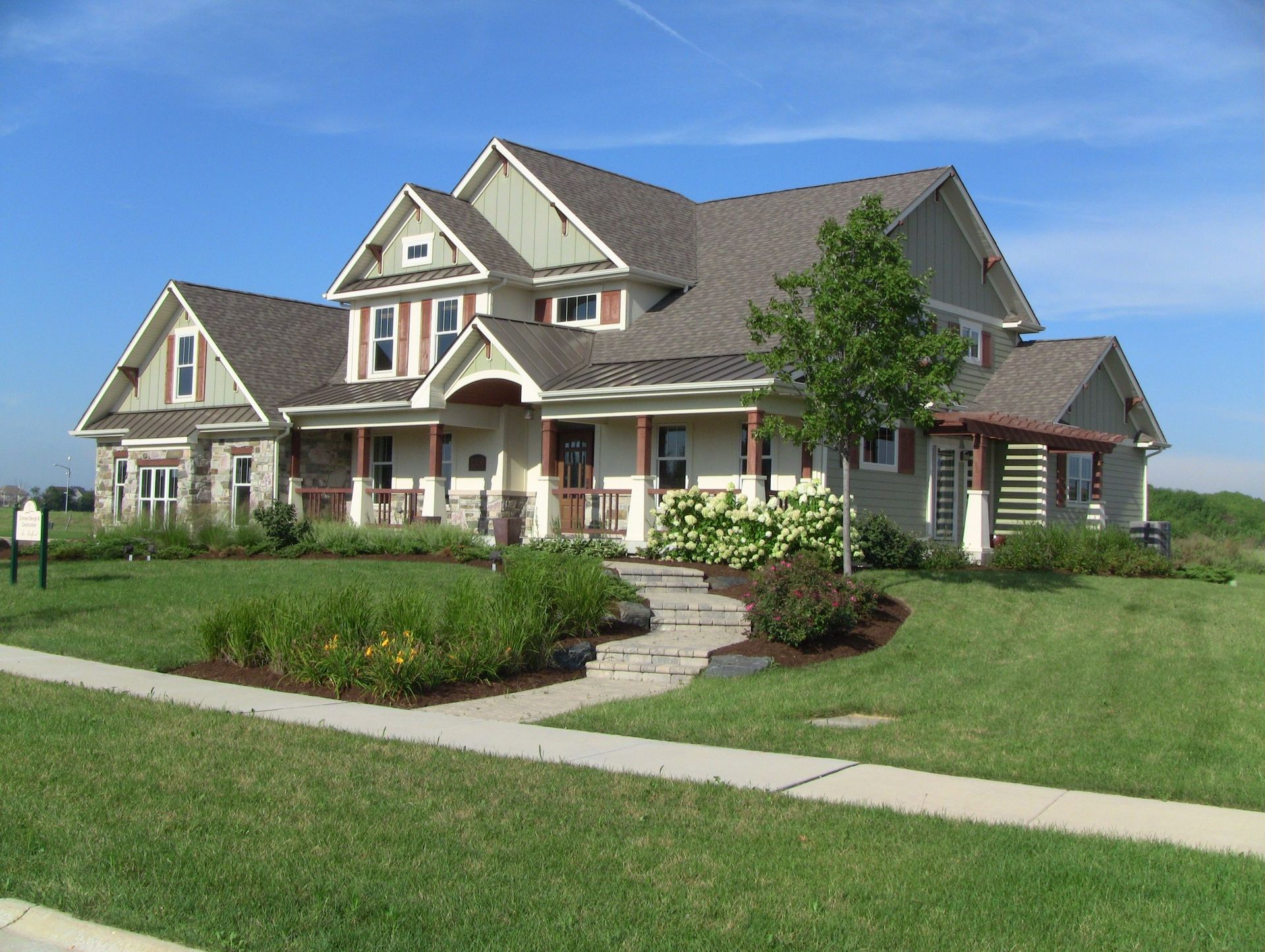 A large house with a walkway leading to it