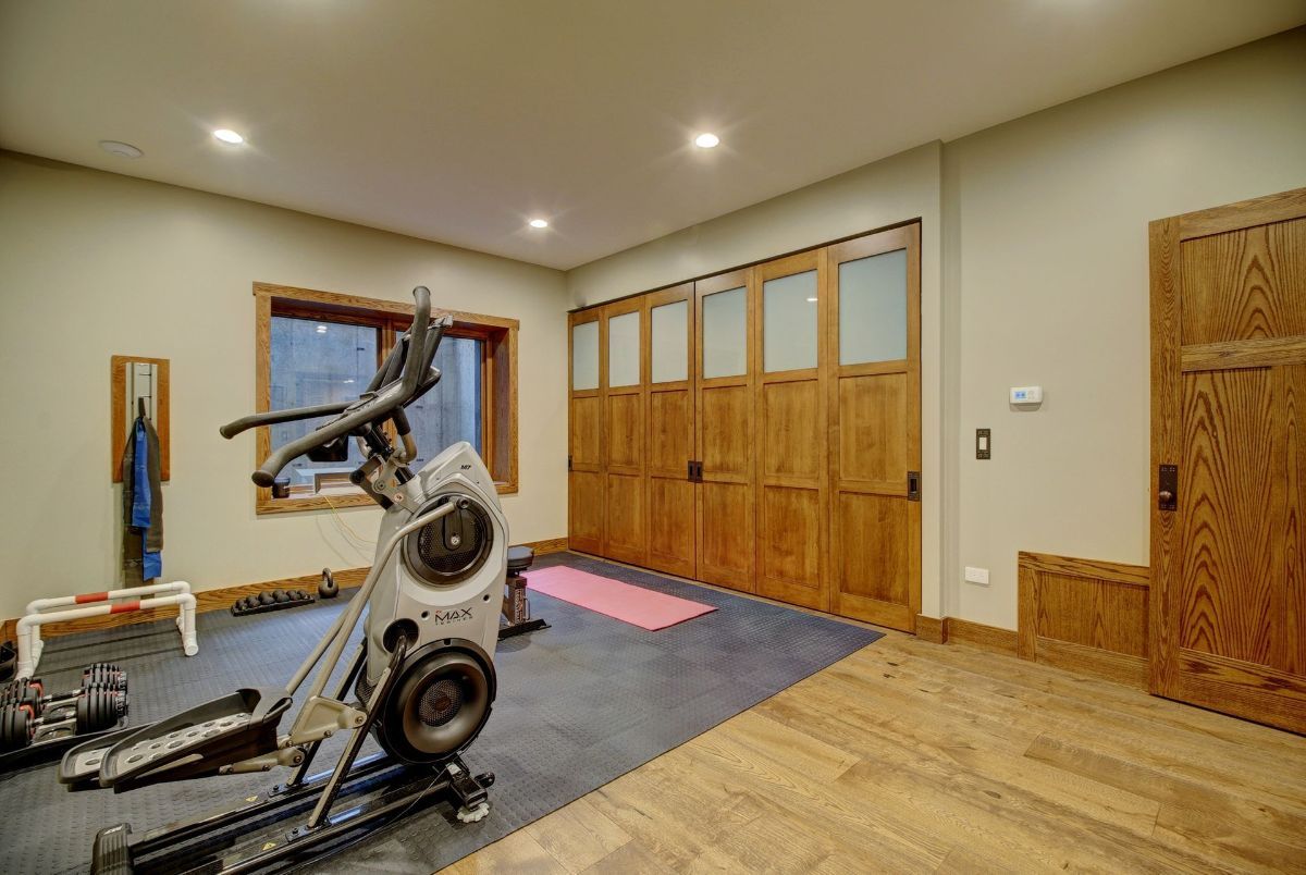 There is a bicycle in the middle of the room.