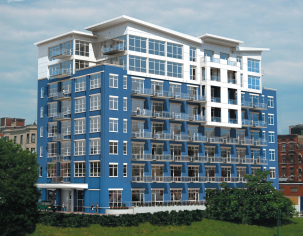 A large blue and white building with lots of windows