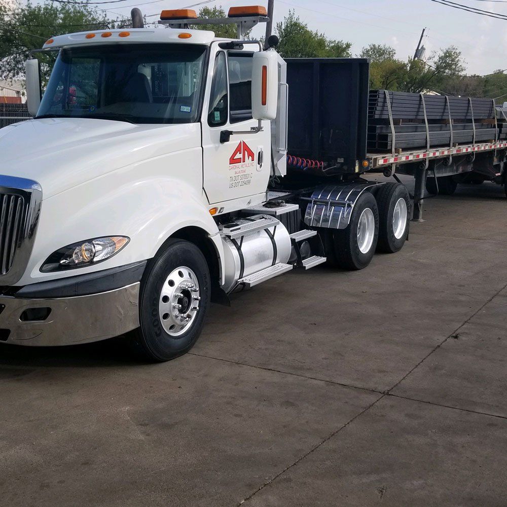 Truck Carrying Steel — Dallas, TX — Cardinal Metals Inc