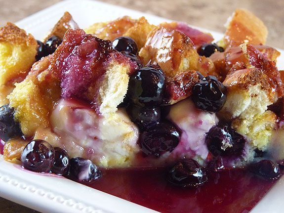 blueberry french toast covered in maple syrup
