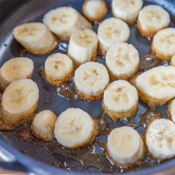 bananas being sauteed in a pan