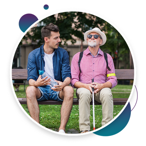 an adult and an elderly sitting on a bench