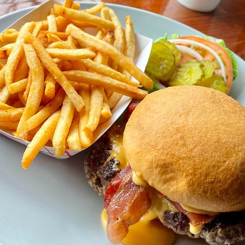 A hamburger and french fries on a plate