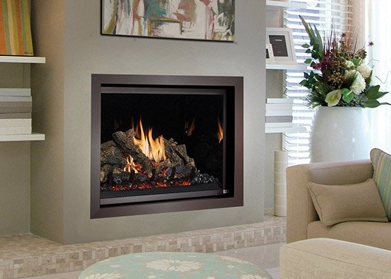 A living room with a fireplace and a couch.