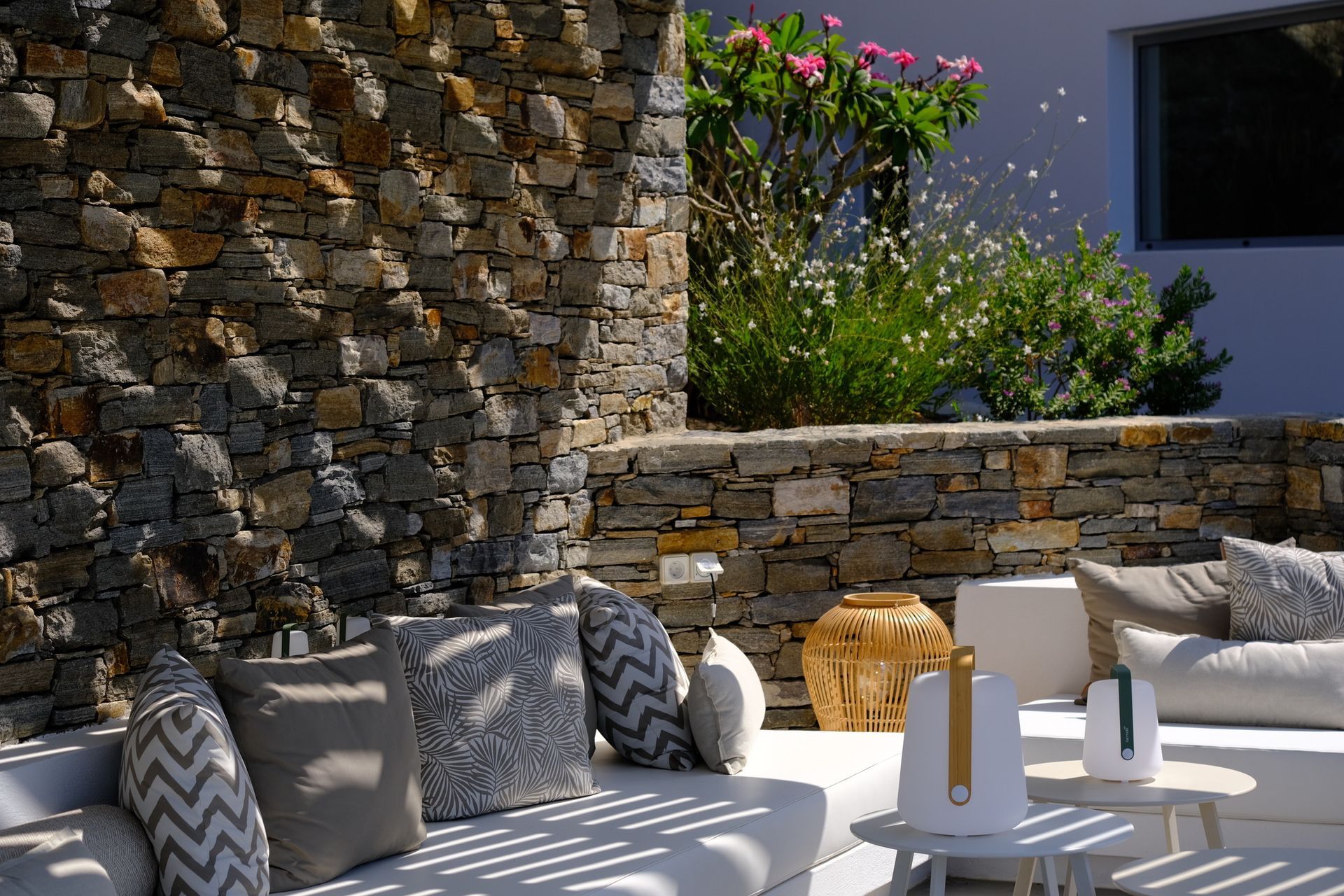 Kyparissi Villa pool area with pergola, sofa, and sea view in Naxos