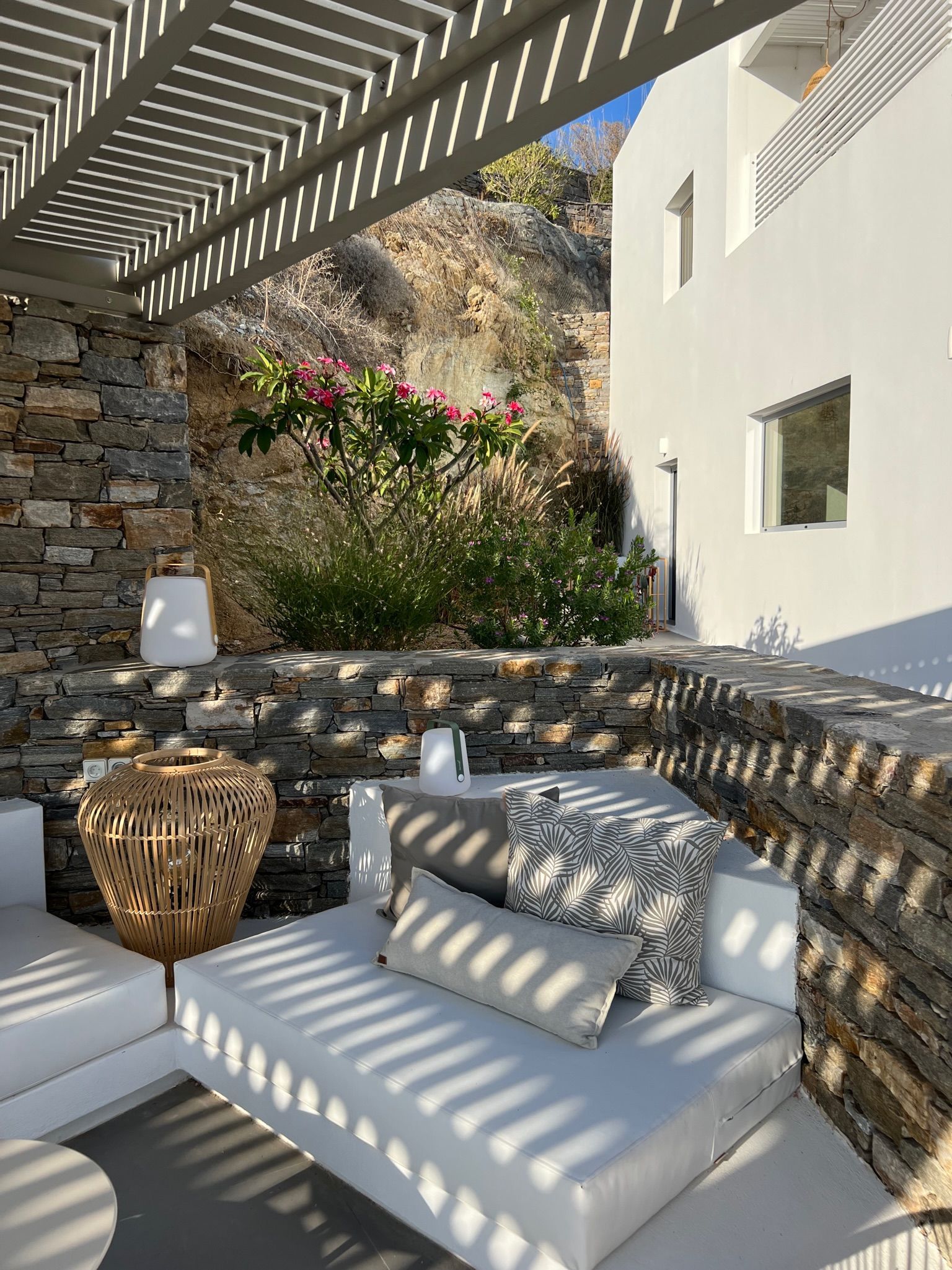 Kyparissi Villa pool area with pergola, sofa, and sea view in Naxos