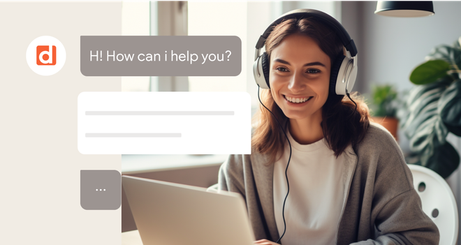 A woman wearing headphones is sitting in front of a laptop computer.