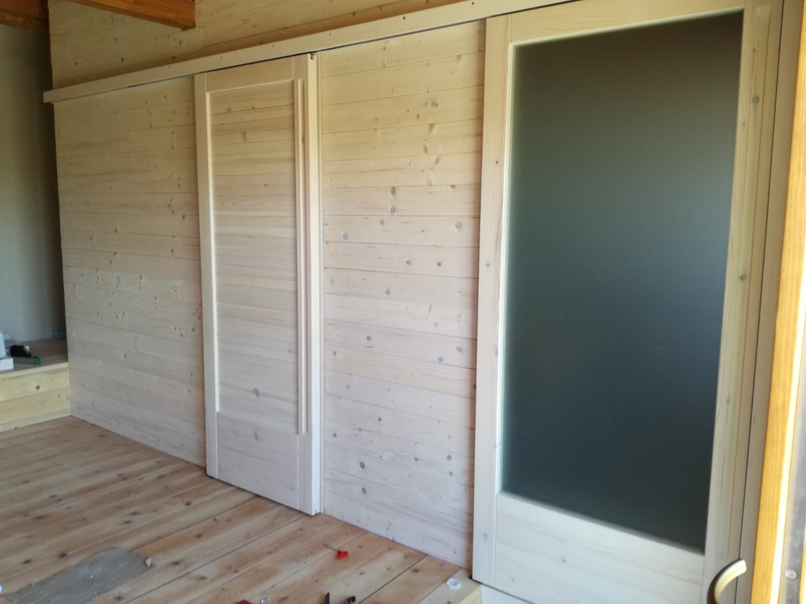 Porta scorrevole in legno