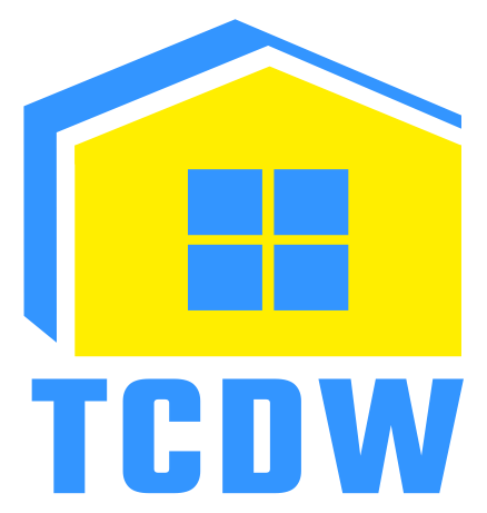 A blue and yellow logo for tc buildings