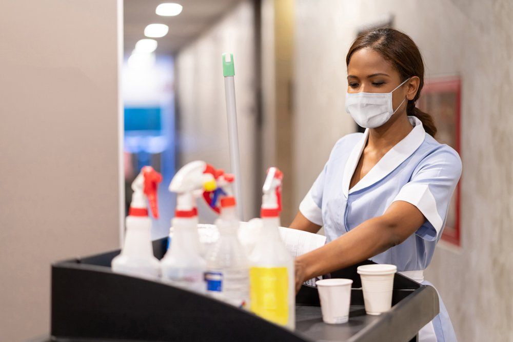 Female Worker Preparing The Cleaning Equipment - Houston, TX - All Premiere Service Solutions