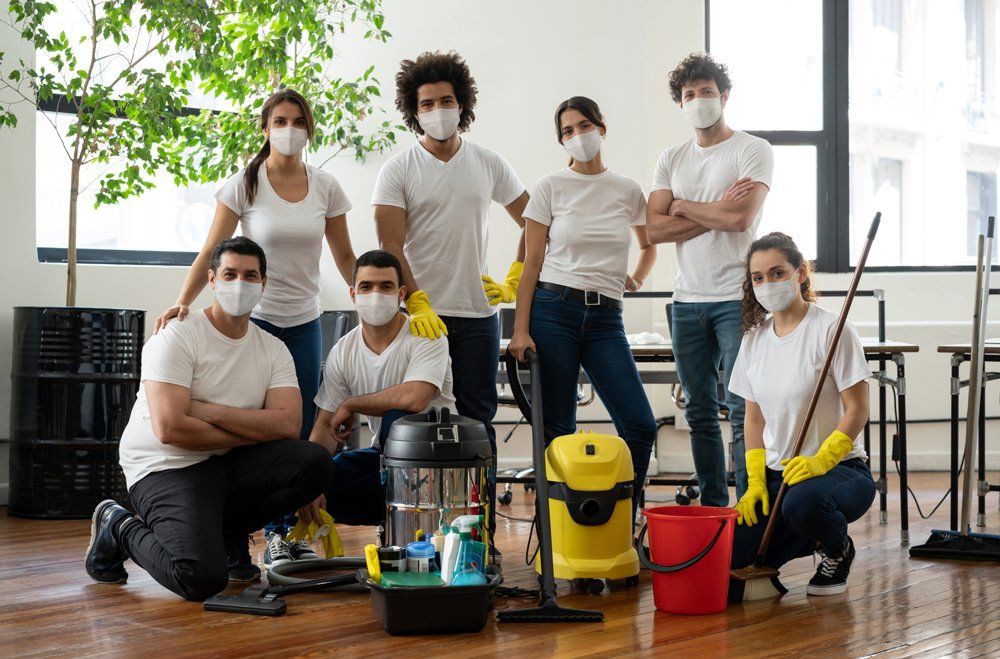 Professional Cleaners Taking A Group Picture - Houston, TX - All Premiere Service Solutions