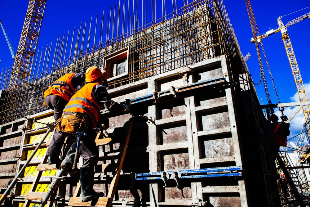 Construction Workers Working On Rebar & Formwork At Building Site — Builders in Riverina, NSW