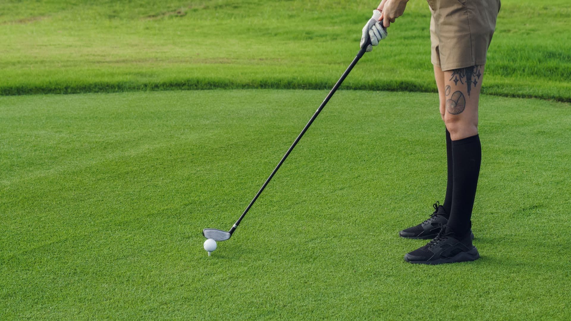 man golfing