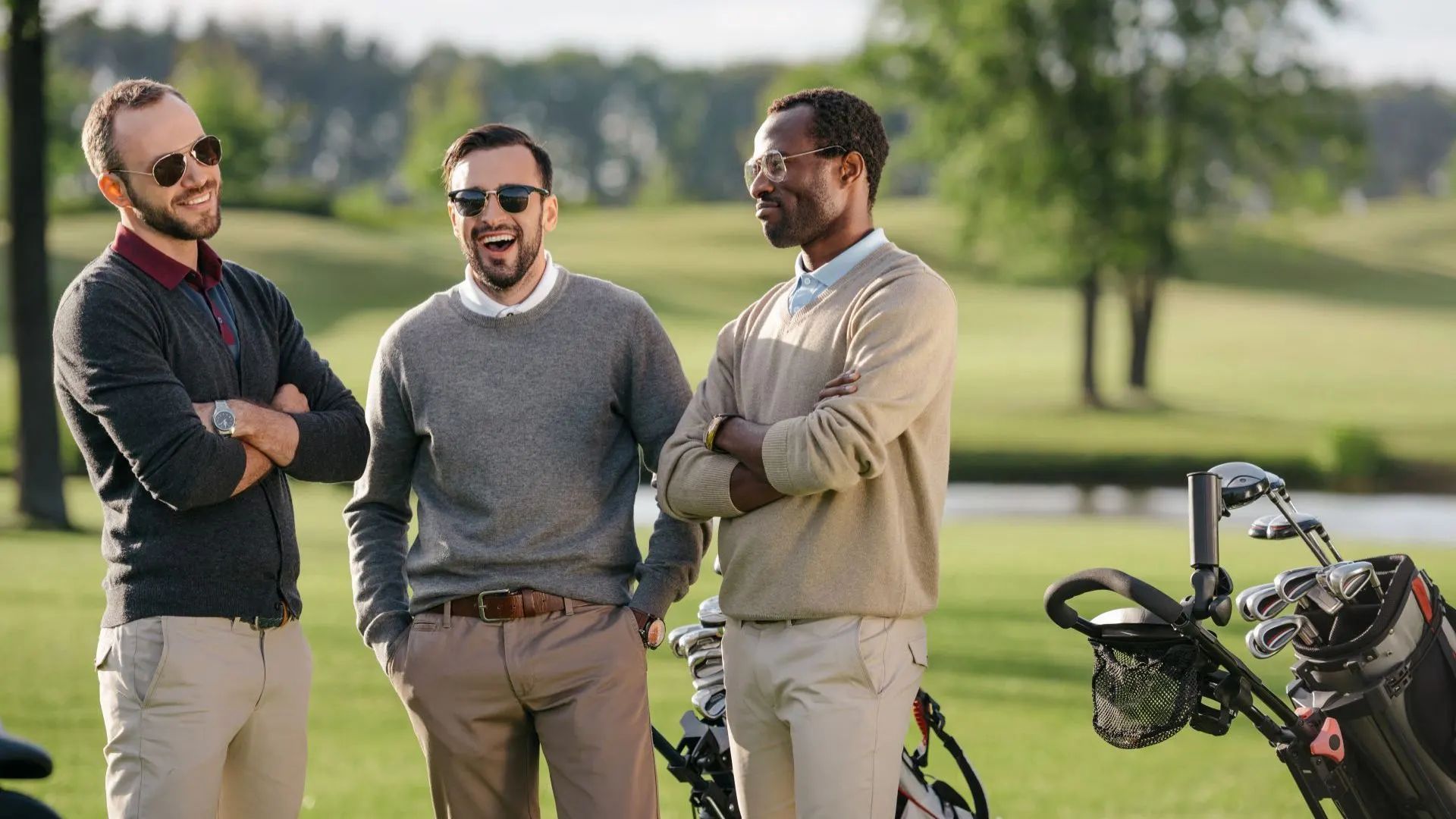 three men on a golf course