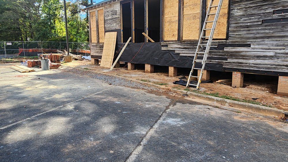 Exterior sheathing installation as part of full home renovation and remodeling project.