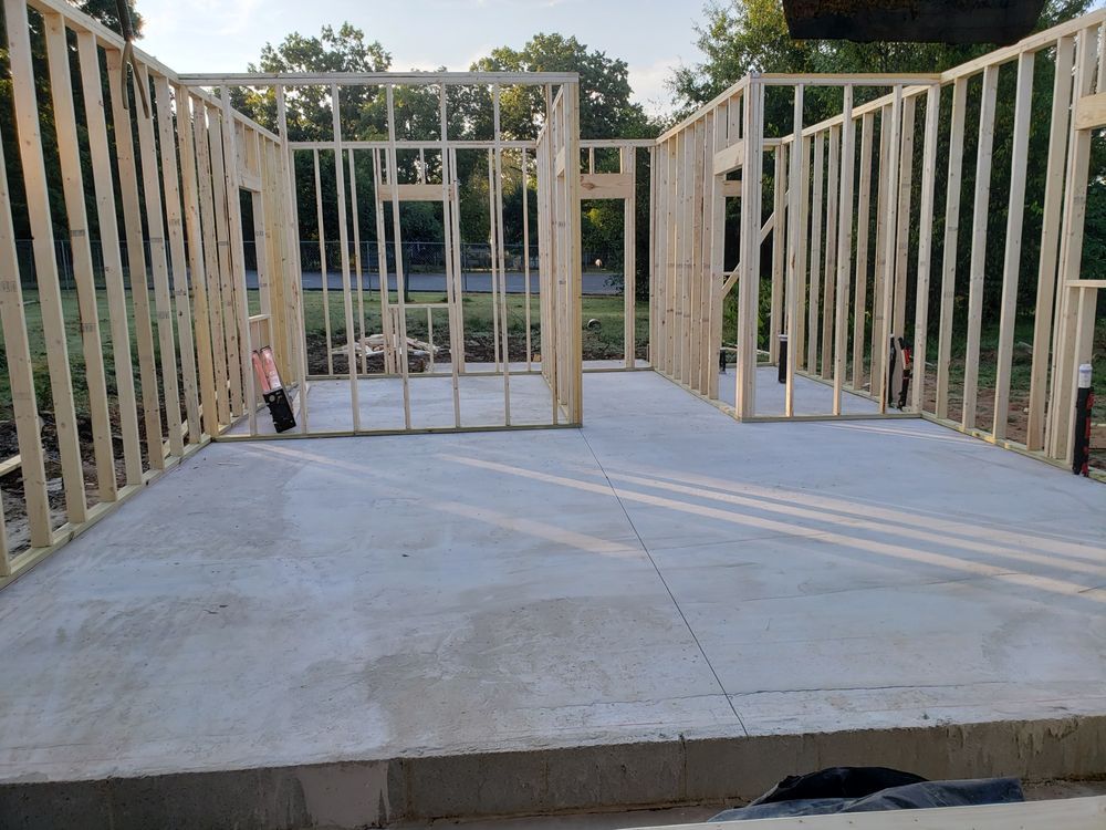 Interior framing during early-phase new home construction work by custom home builders.