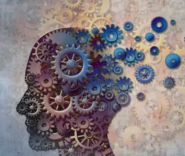 Un disegno della testa di una persona fatta di ingranaggi