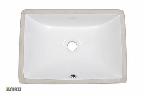 A white bathroom sink with a drain hole on a white background.