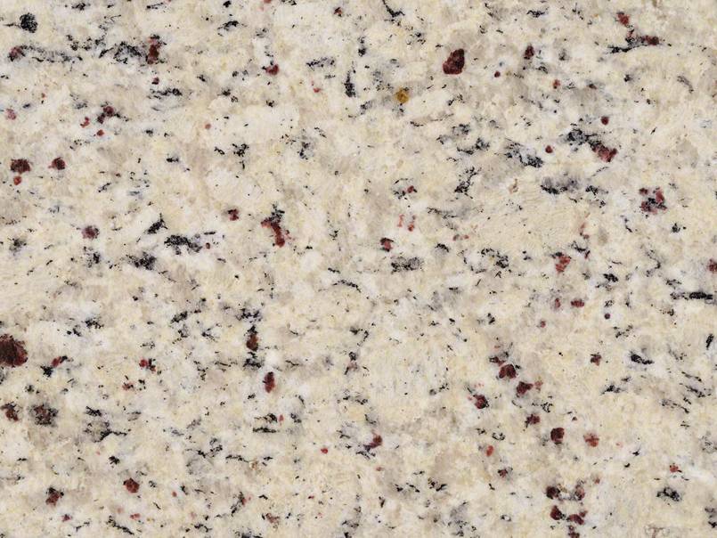 A close up of a white granite counter top