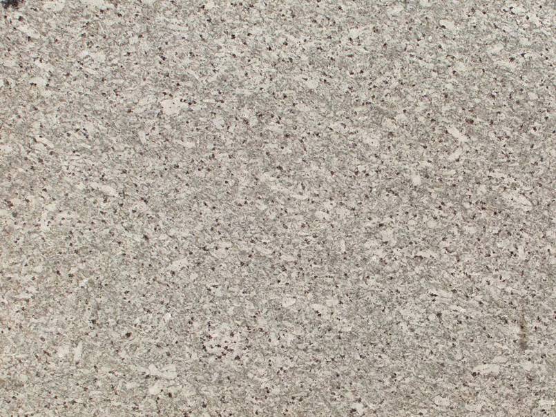A close up of a gray granite counter top.