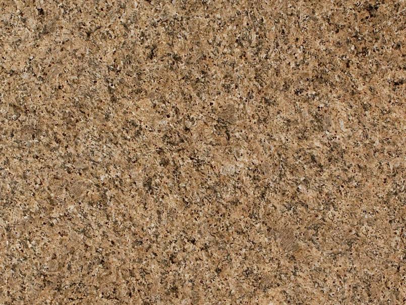 A close up of a brown granite counter top.