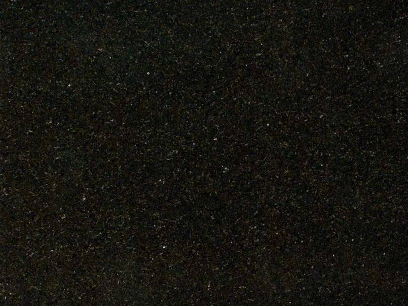A close up of a black granite counter top.