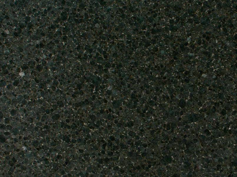 A close up of a black granite counter top
