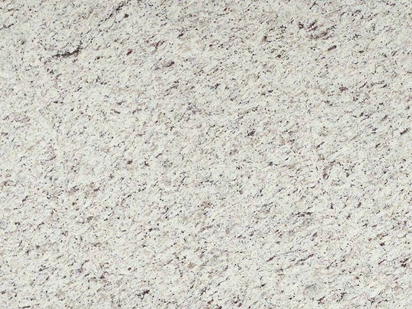 A close up of a white granite counter top