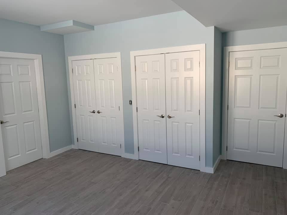 There are a lot of doors in this room.