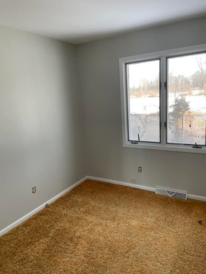 There is a large window in the middle of the room.