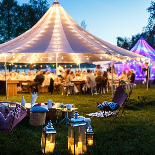 Colorful wedding tents at night