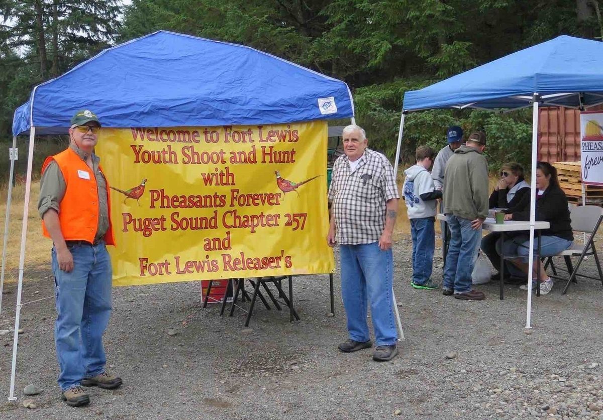 Two Guys Near The Tarpaulin — Tacoma, WA — Pheasants Forever