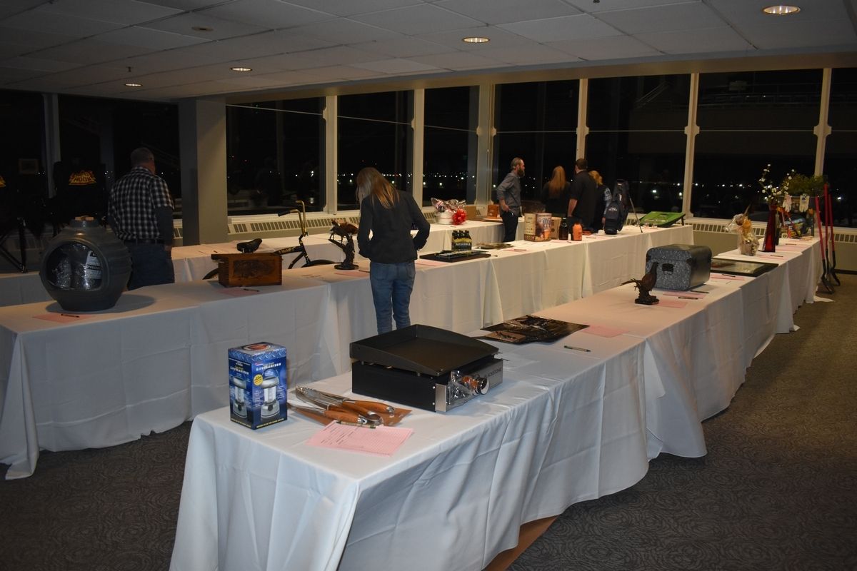Arranging Tables For The Event — Tacoma, WA — Pheasants Forever