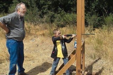 Senior Teaching A Young Boy — Tacoma, WA — Pheasants Forever