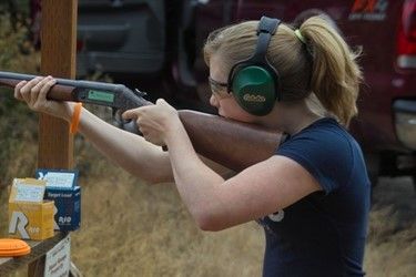 Young Lady Holding A Gun — Tacoma, WA — Pheasants Forever