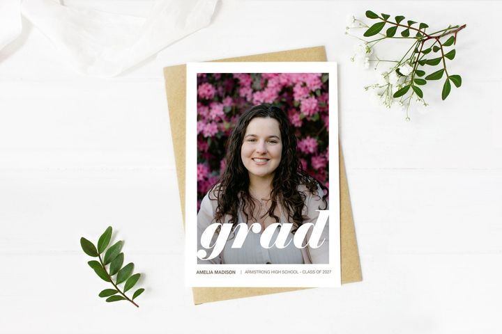 2025 calendar hanging on wall surrounded by decorations.