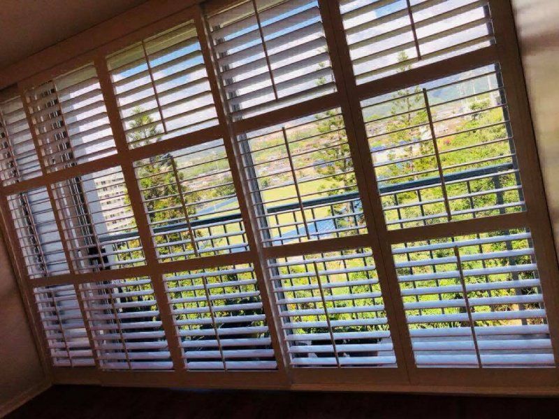 view of windows with installed blinds